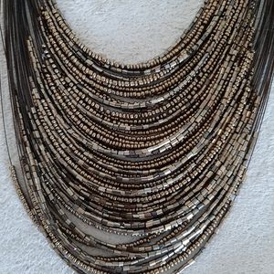 Gorgeous set of necklace and earrings in tones of brown and shimmery gold